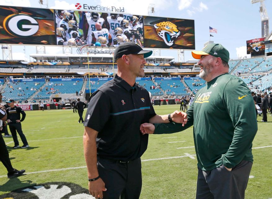 Jacksonville Jaguars head coach Gus Bradley left and