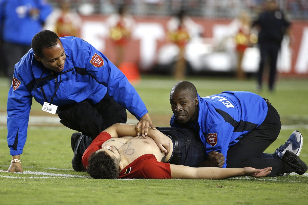 The 49ers fan gets tackled