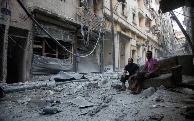 Aleppo's rebel-controlled neighbourhood of Karm al Jabal on 18 September following an air strike