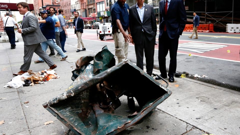 The remains of a mangled dumpster after an explosion in the Chelsea neighbourhood of New York