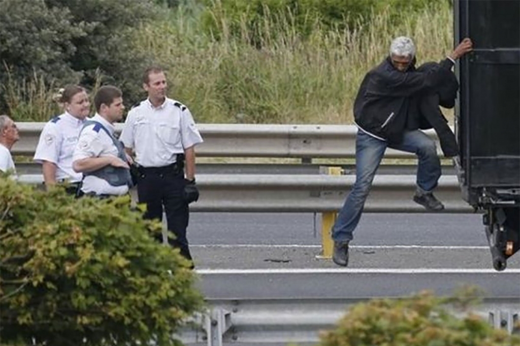 The wall will stop refugees and migrants climbing aboard lorries and making the journey across the Channel