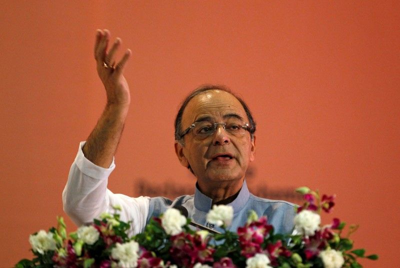 India's Finance Minister Jaitley gestures as he addresses a gathering during a seminar in Ahmedabad