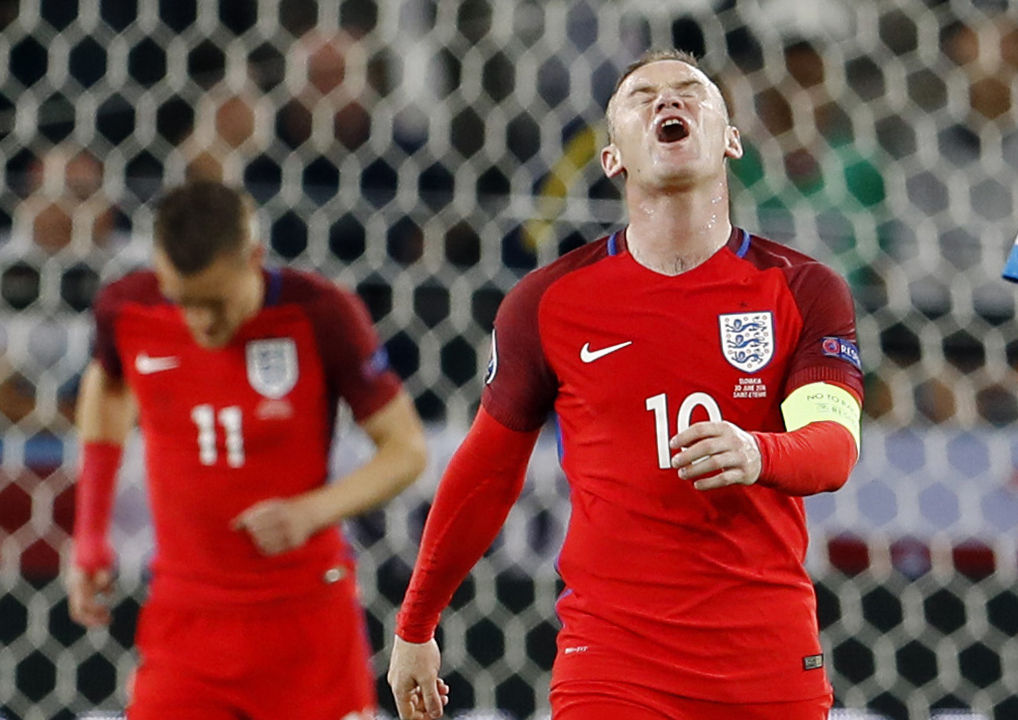 England's Wayne Rooney reacts