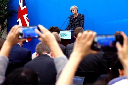 British Prime Minister Theresa May speaks at a press conference held at the end of the G-20 summit in Hangzhou in eastern China's Zhejiang province Monday Sept. 5 2016