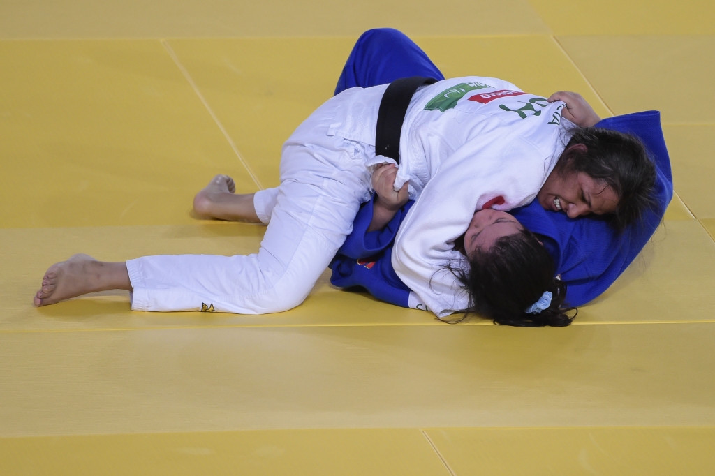 RIO DE JANEIRO BRAZIL- SEPTEMBER 10 Deanne Silva de Almeida of Brasil battles with Christella Garcia of United States of America during the Women +70 kg Judo Bronze Medal match on Day 3 of the Rio 2016 Paralympic Games