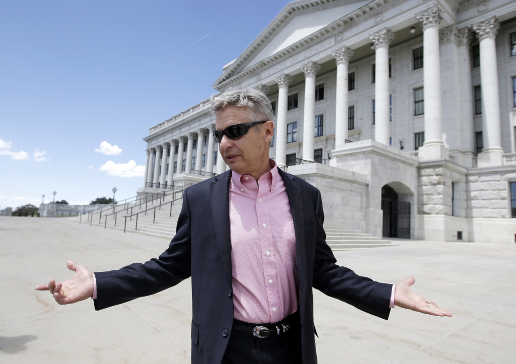 Libertarian presidential candidate former New Mexico Gov. Gary Johnson leaves the Utah State Capitol after meeting with with legislators in Salt Lake City. The day after political heavyweight Mitt Romney name-drop