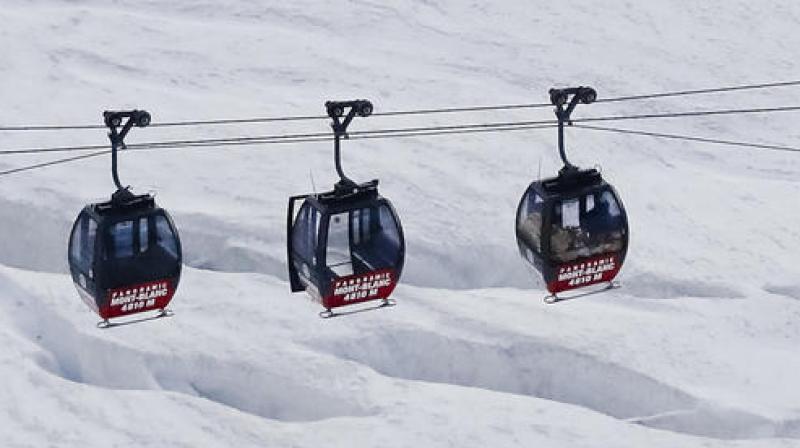 Thirty people in cable cars closest to the ground managed to climb down with the help of rescuers