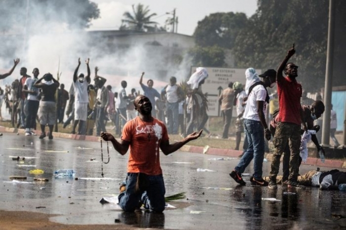 Three people were apparently shot dead by security forces and many more wounded after crowds tried to storm the offices of the electoral commission