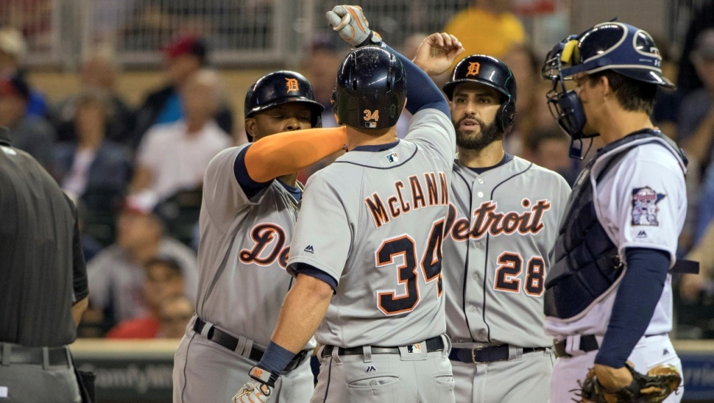 Tigers DH James Mc Cann celebrates his 3-run homer part of a power surge that swamped the Twins 8-1