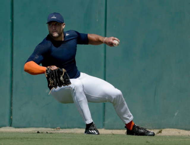 Tim Tebow showing off his uh...athletic grace during a showcase at USC last month