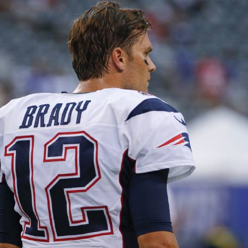 Patriots quarterback Tom Brady watches his team warm up before a preseason NFL football game against the New York Giants on Thursday Sept. 1 2016 in East Rutherford N.J