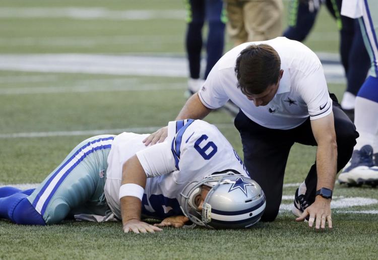 Tony Romo broke his back in a preseason game against the Seahawks on Aug. 25