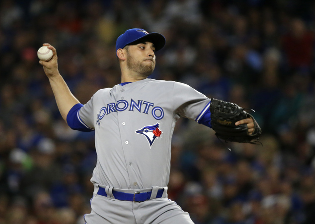 Toronto Blue Jays starting pitcher Marco Estrada throws against the Seattle Mariners in the first inning of a baseball game Monday Sept. 19 2016 in Seatt