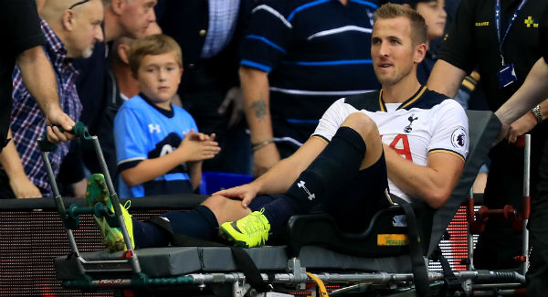 Tottenham Hotspur’s Harry Kane leaves on a stretcher with an injury at White Hart Lane