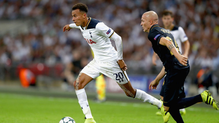 Tottenham's Dele Alli takes on Andrea Raggi of Monaco at Wembley