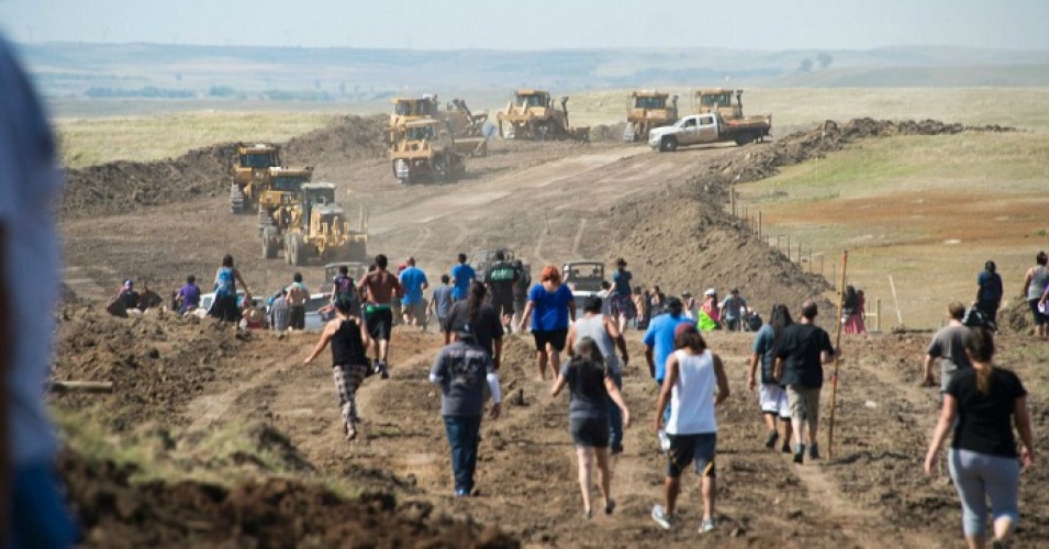 Activists confront construction activities which they say deliberately targeted sacred sites to'provoke violence