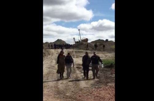 Colorlines screen shot of people being arrested taken from the Red Warrior Camp Facebook page taken