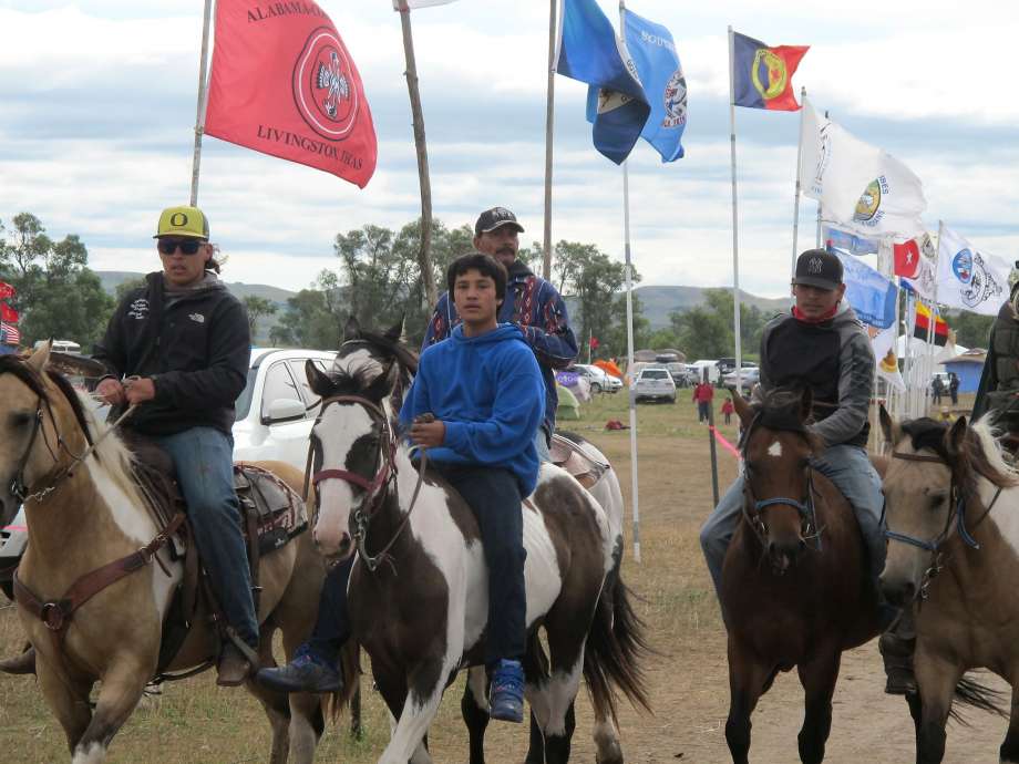 Horseback riders make their way through an encampment near North Dakota's Standing Rock Sioux reservation on Friday Sept. 9 2016. The Standing Rock Sioux tribe's attempt to halt construction of an oil pipeline near its North Dakota reservation failed