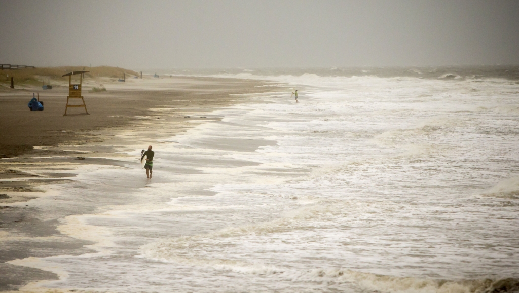 Hermine weakens from hurricane to tropical storm