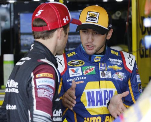 Chase Elliott right talks with Kasey Kahne