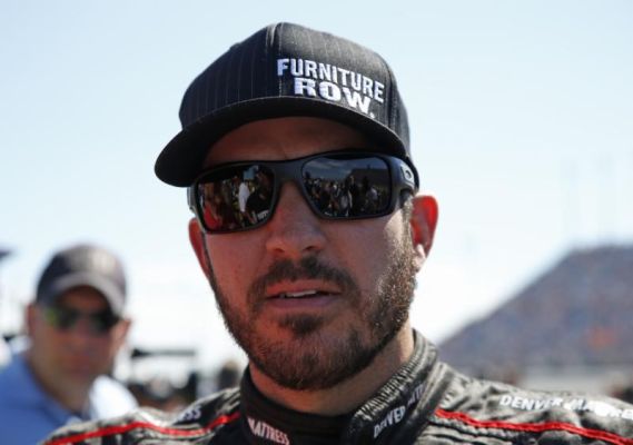 Martin Truex Jr. looks around before a NASCAR