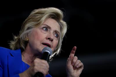 Clinton vows to hunt IS chief, slams 'dangerous' Trump