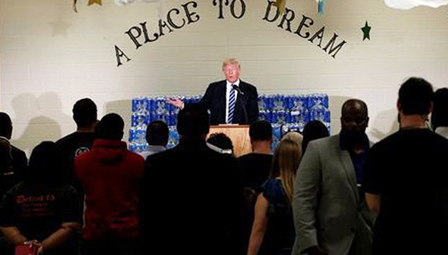 Pastor cuts Trump short during anti-Clinton speech in Flint