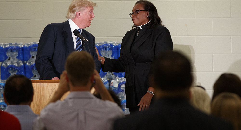 Rev. Faith Green Timmons interrupts Republican presidential candidate Donald Trump