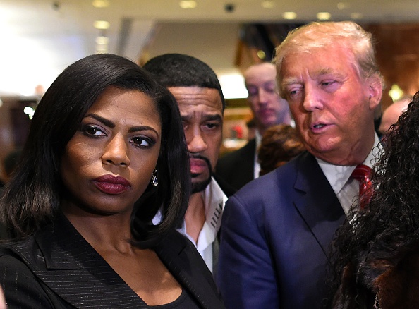 Omarosa Manigault  who was a contestant on the first season of Donald Trump's'The Apprentice and is now an ordained minister appears alongside Republican presidential hopeful Donald Trump during a press conference