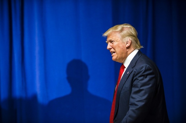 Republican Presidential nominee Donald Trump walks to the stage before addressing supporters