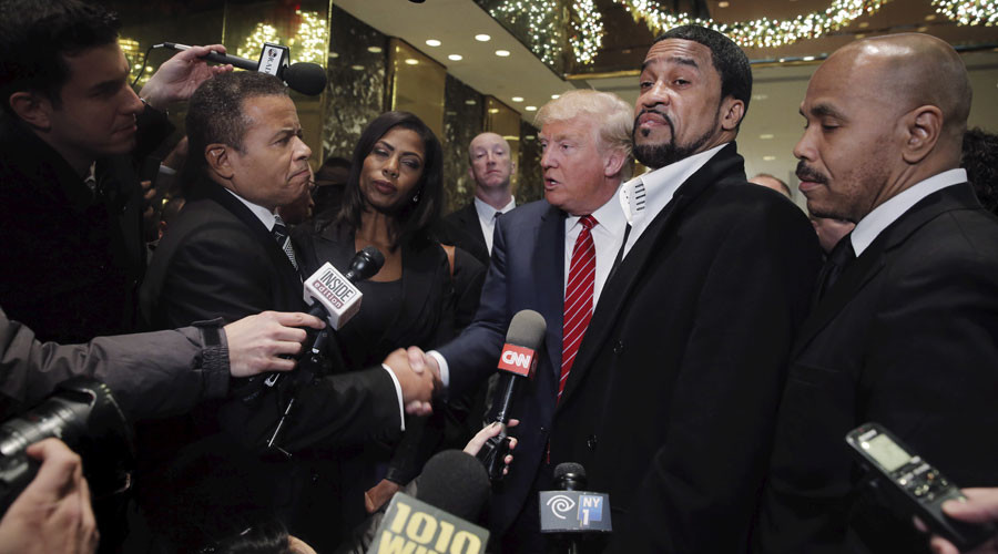 Presidential candidate Donald Trump speaks to the media after meeting with a group of black pastors at his office in the Manhattan borough of New York