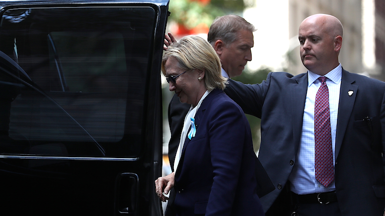 Democratic presidental nominee former Secretary of State Hillary Clinton gets into a van as she leaves the home of her daughter Chelsea Clinton