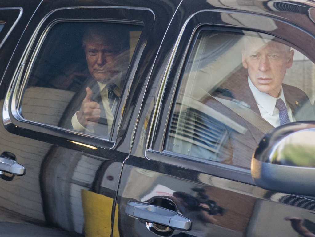 Republican presidential candidate Donald Trump gestures as he leaves an appearance on a television talk show Wednesday Sept. 14 2016 in New York