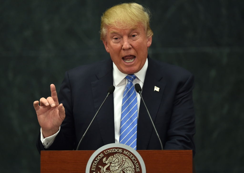 US presidential candidate Donald Trump delivers a joint press conference with Mexican President Enrique Pena Nieto in Mexico City