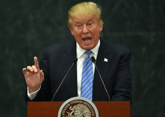 US presidential candidate Donald Trump delivers a joint press conference with Mexican President Enrique Pena Nieto in Mexico City on August 31