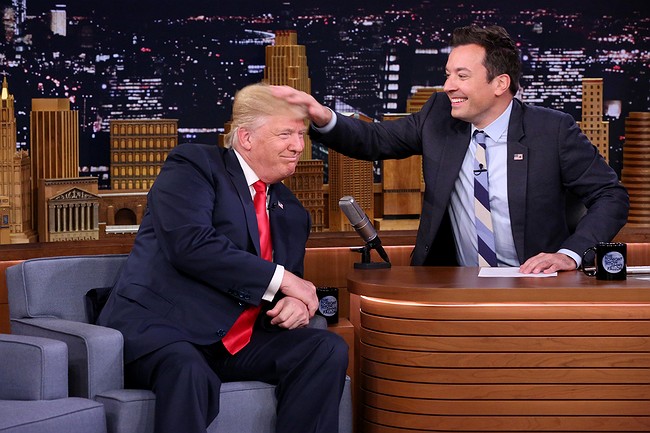 Fallon musses Trump's hair on Tonight Show