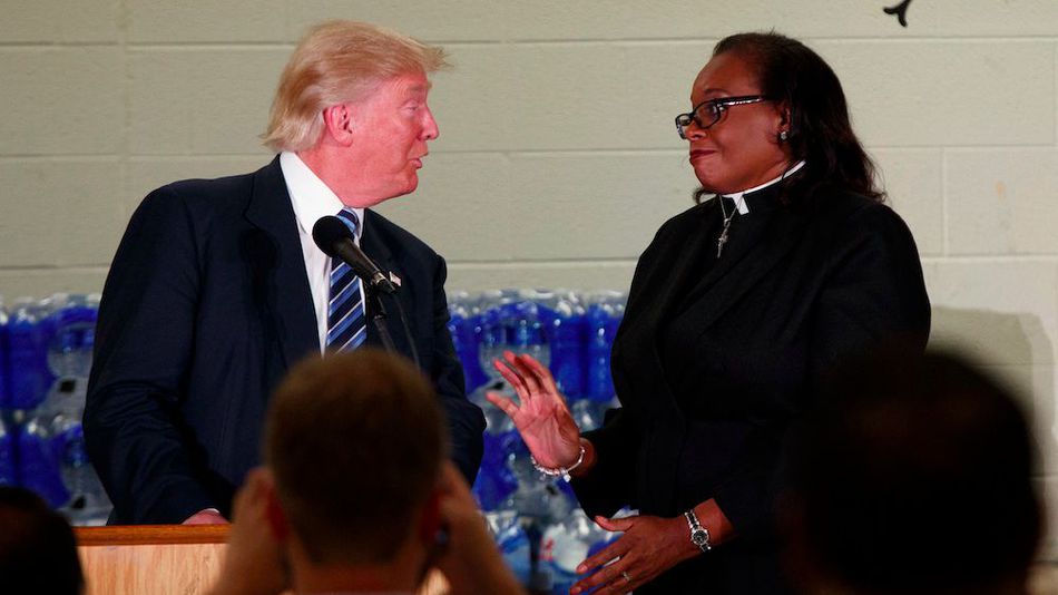 Rev. Faith Green Timmons interrupts Republican presidential candidate Donald Trump as he spoke during a visit to Bethel United Methodist Church