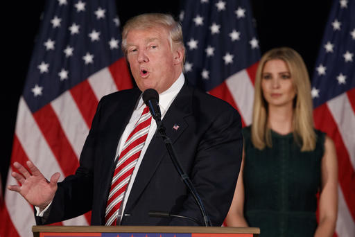 Ivanka Trump right listens as her father Republican presidential candidate Donald Trump delivers a policy speech on child care Sept. 13 2016 in Aston Pa