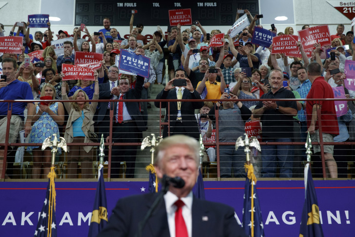 Trump says Clinton running 'hate-filled campaign' at tense North Carolina rally where violence flares up