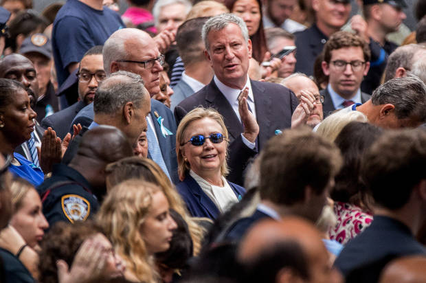 Clinton campaign says she left 9/11 event feeling overheated