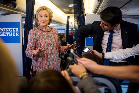 After several days of recovering from pneumonia at home Democratic Nominee for President of the United States former Secretary of State Hillary Clinton returns to the campaign trail beginning her day by greeting the Press Corp aboard the campaign plane