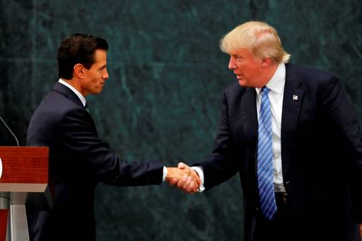 Mexico President Enrique Pena Nieto and Republican presidential nominee Donald Trump shake hands after a joint statement at Los Pinos the presidential official residence in Mexico City