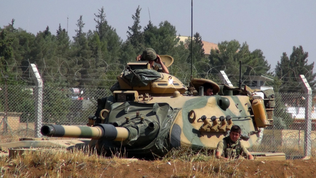 A Turkish army tank stationed near the Syrian border in Suruc Turkey Saturday Sept. 3 2016. Turkey's state-run news agency says Turkish tanks have entered Syria's Cobanbey district northeast of Aleppo in a'new phase of the Euphrates Shiel