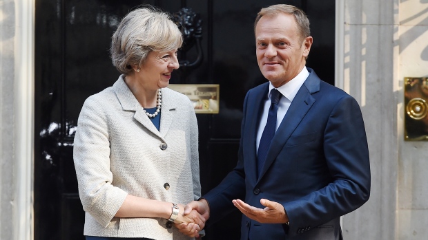 British Prime Minister Theresa May welcomes European Council President Donald Tusk to 10 Downing Street in London on Thursday. May and Tusk held talks on Britain's exit from the European Union