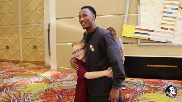 Twitter  FSUFootball
FSU football player Travis Rudolph is seen embracing Bo Paske during their emotional reunion on Sunday