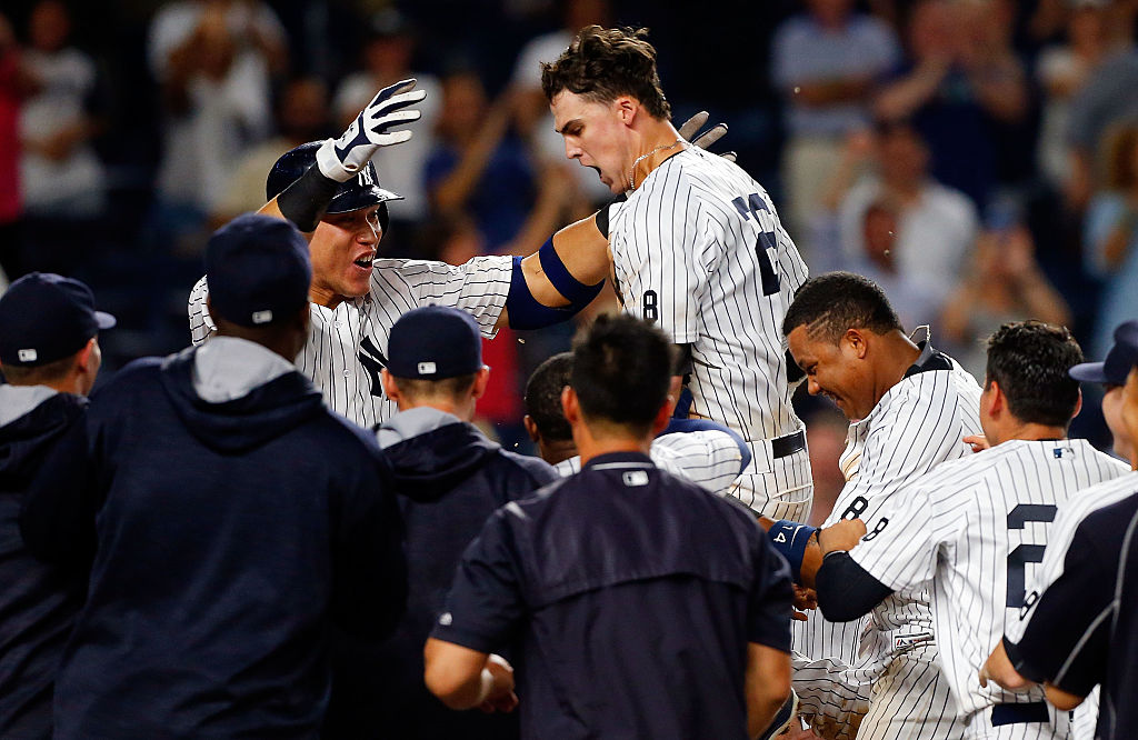 Tyler Austin #26 of the New York Yankees celebrates his ninth inning game winning home run against the Tampa Bay Rays