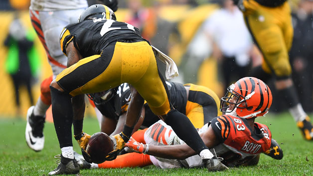 Robert Golden #21 of the Pittsburgh Steelers recovers a Tyler Boyd #83 of the Cincinnati Bengals fumble in the fourth quarter during the game at Heinz Field