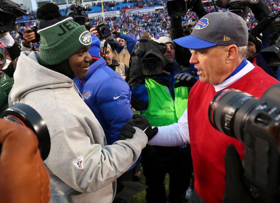 FILE- In this Jan. 3 2016 New York Jets head coach Todd Bowles left and Buffalo Bills head coach Rex Ryan right shake hands after the Bills 22-17 win in an NFL football game in Orchard Park N.Y. The Jets are heading to Orchard Park for an AFC Eas