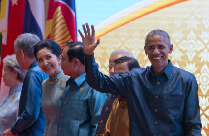 U.S. President Obama waves white attending the ASEAN Summit in Laos