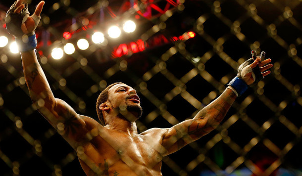 BOSTON MA- AUGUST 17 Michael Johnson celebrates following his win against Joe Lauzon in their middleweight bout at TD Garden